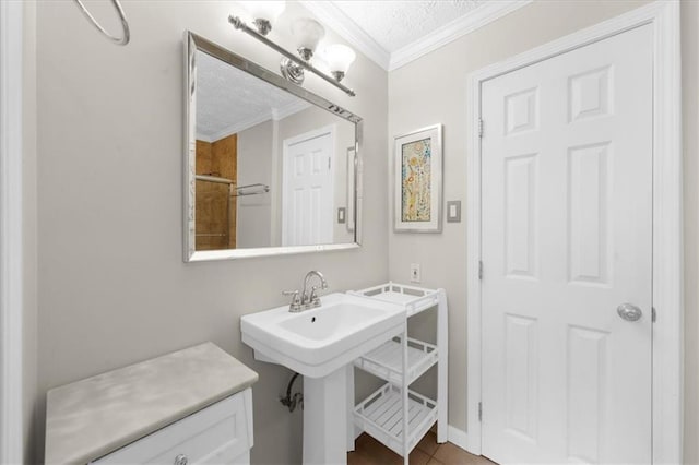 1822 N Rock Springs Rd NE Unit 24, Atlanta, GA 30324 - bathroom with crown molding, a textured ceiling, a shower, and tile patterned floors