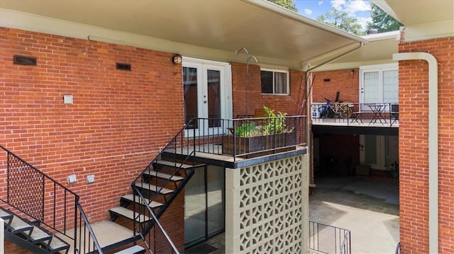 1822 N Rock Springs Rd NE Unit 24, Atlanta, GA 30324 - doorway to property featuring french doors and brick siding