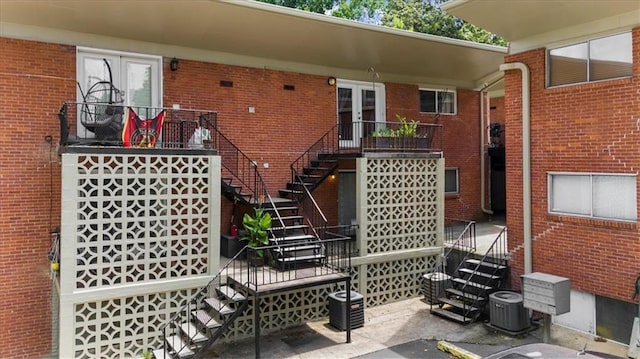 1822 N Rock Springs Rd NE Unit 24, Atlanta, GA 30324 - view of patio / terrace featuring stairs and french doors