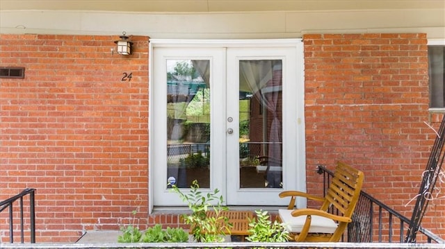 1822 N Rock Springs Rd NE Unit 24, Atlanta, GA 30324 - property entrance featuring french doors and brick siding