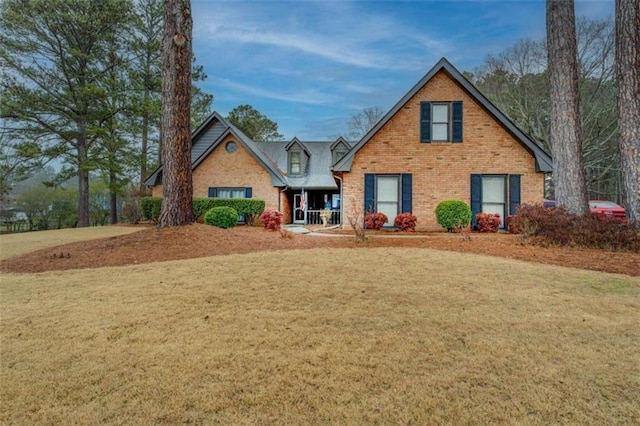 view of front of home with a front yard