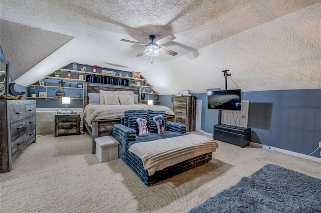 carpeted bedroom with ceiling fan, lofted ceiling, and a textured ceiling