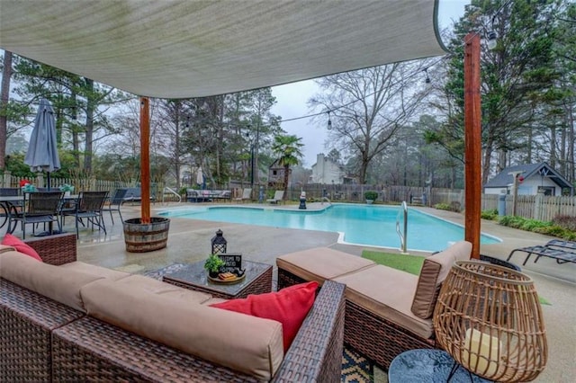 view of swimming pool with a patio and outdoor lounge area