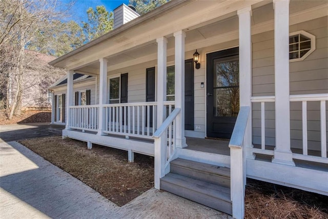 entrance to property with a porch