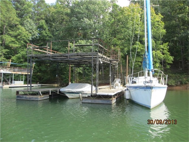 dock area with a water view