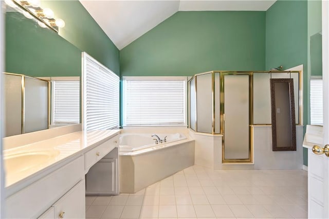 bathroom with tile patterned floors, separate shower and tub, vanity, and high vaulted ceiling