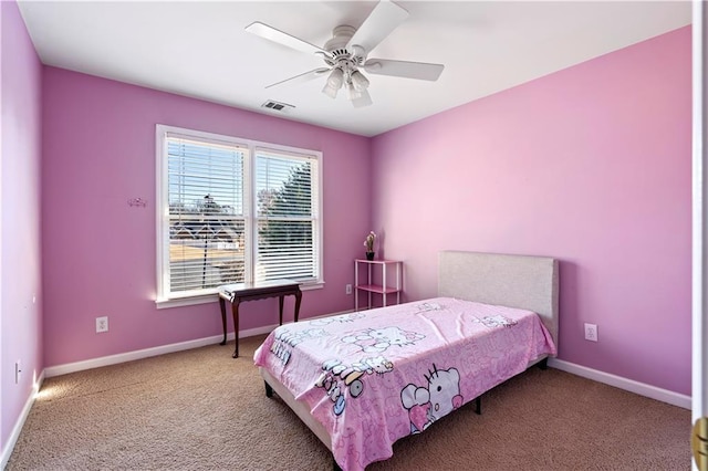 carpeted bedroom featuring ceiling fan