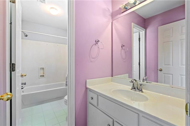 full bathroom with bathtub / shower combination, vanity, and toilet