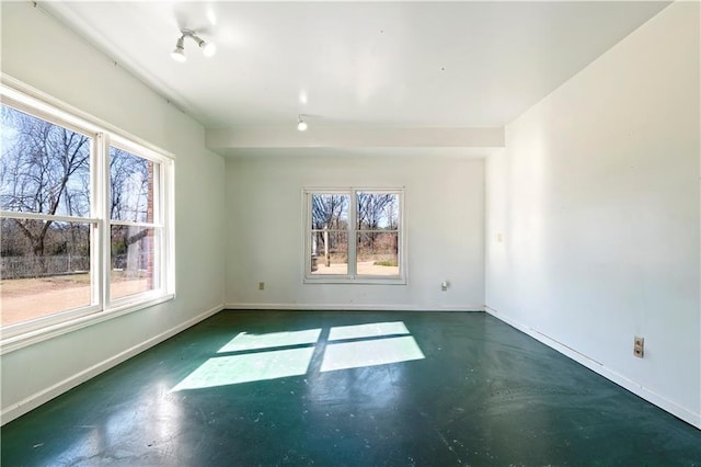 unfurnished room with a wealth of natural light