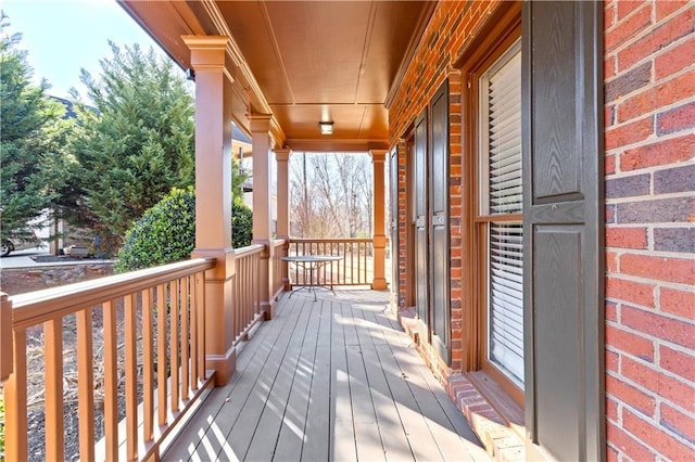 wooden terrace with covered porch