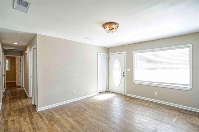 entrance foyer with hardwood / wood-style floors