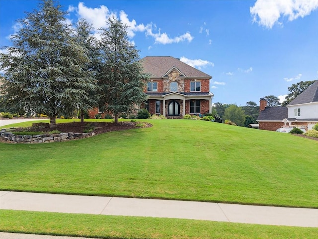 4645 Manor Dr, Gainesville, GA 30506 - view of front of house featuring a front yard and brick siding