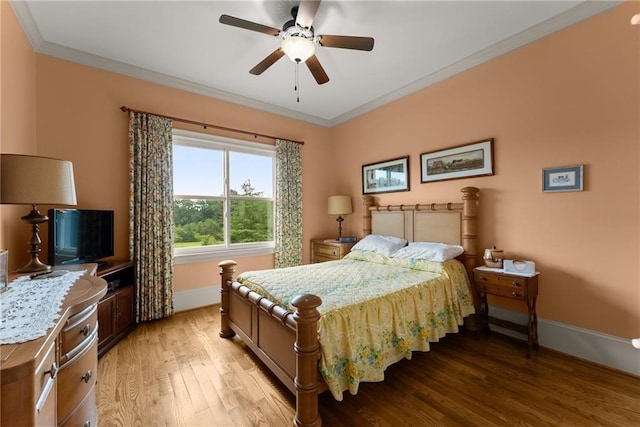 4645 Manor Dr, Gainesville, GA 30506 - bedroom featuring light wood-style flooring, crown molding, baseboards, and a ceiling fan