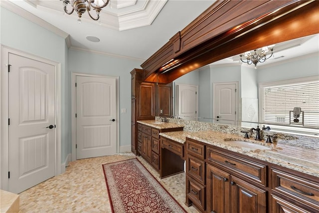 4645 Manor Dr, Gainesville, GA 30506 - bathroom with a chandelier, crown molding, double vanity, a raised ceiling, and baseboards