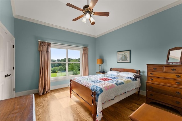 4645 Manor Dr, Gainesville, GA 30506 - bedroom with wood finished floors, ornamental molding, baseboards, and ceiling fan