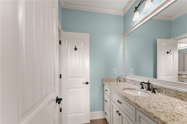 4645 Manor Dr, Gainesville, GA 30506 - bathroom featuring vanity, ornamental molding, and baseboards