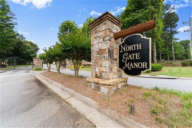 4645 Manor Dr, Gainesville, GA 30506 - community / neighborhood sign featuring a gate
