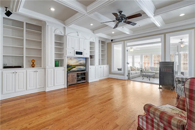 living area with coffered ceiling, recessed lighting, ornamental molding, beamed ceiling, and light wood-type flooring