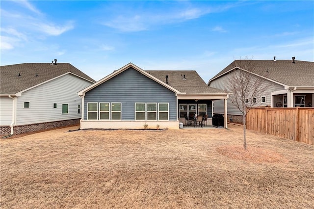 back of property with a patio area