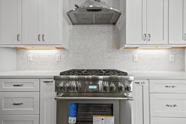1101 Cooks Farm Way, Woodstock, GA 30189 - kitchen with high end stainless steel range oven, extractor fan, light countertops, and decorative backsplash
