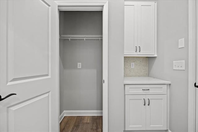 1101 Cooks Farm Way, Woodstock, GA 30189 - laundry area featuring dark wood-type flooring and baseboards