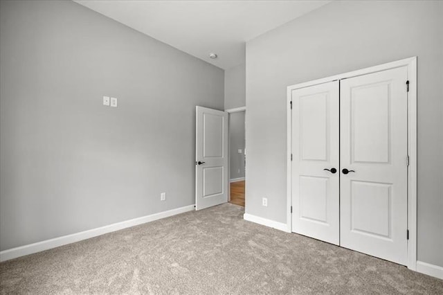 1101 Cooks Farm Way, Woodstock, GA 30189 - unfurnished bedroom with carpet flooring, a closet, and baseboards