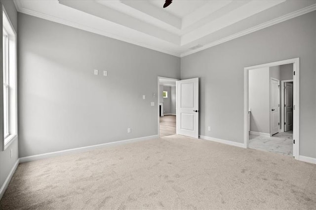 1101 Cooks Farm Way, Woodstock, GA 30189 - unfurnished bedroom with a raised ceiling, carpet flooring, crown molding, baseboards, and connected bathroom