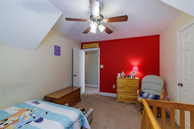 bedroom with baseboards, carpet, and ceiling fan