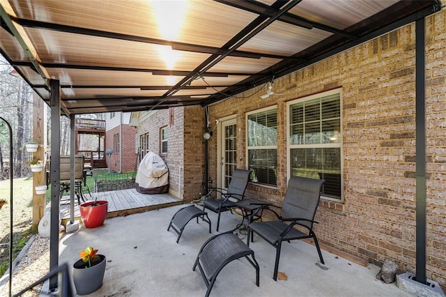 view of patio with a wooden deck