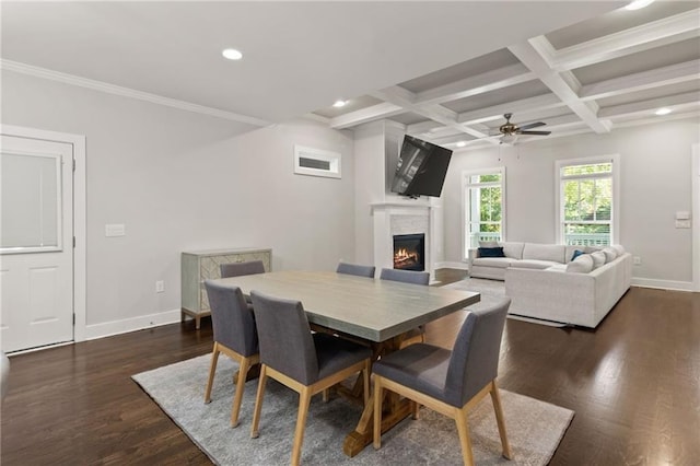 dining room featuring recessed lighting, a ceiling fan, dark wood-style floors, a lit fireplace, and baseboards