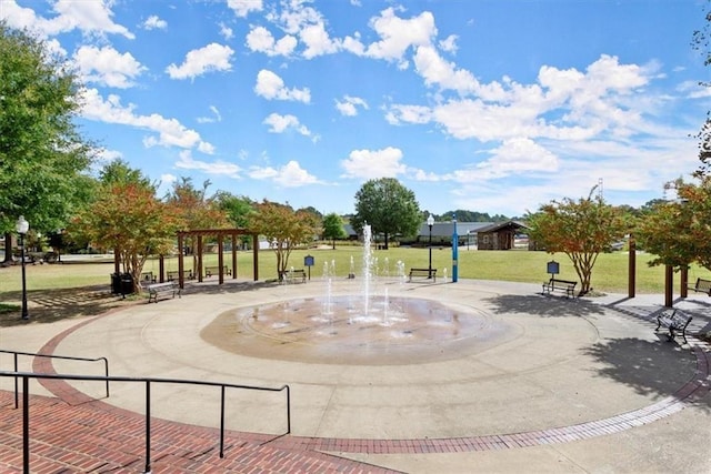 view of community featuring a yard