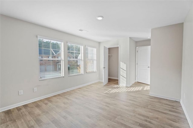 empty room featuring light hardwood / wood-style floors