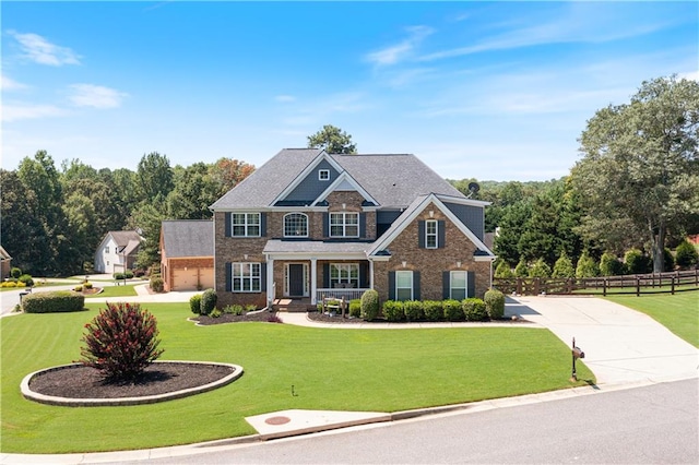 craftsman-style home with a front lawn