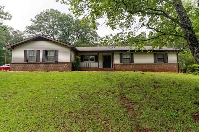 265 Forest Lake Dr, Covington, GA 30016 - ranch-style house featuring brick siding and a front yard