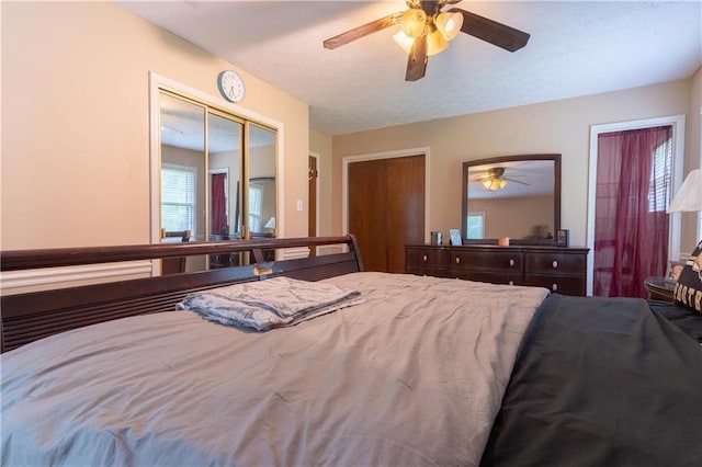 265 Forest Lake Dr, Covington, GA 30016 - bedroom with ceiling fan and a textured ceiling