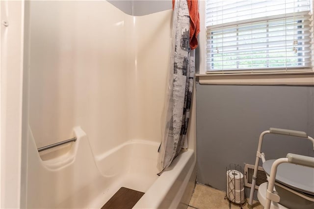 265 Forest Lake Dr, Covington, GA 30016 - full bath featuring shower / bath combo and tile patterned flooring