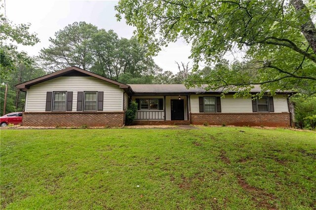265 Forest Lake Dr, Covington, GA 30016 - single story home featuring brick siding and a front yard