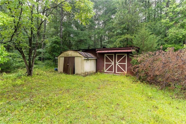 265 Forest Lake Dr, Covington, GA 30016 - view of shed with a view of trees