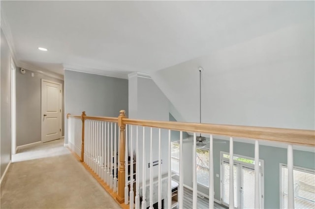 hallway with recessed lighting, carpet, and baseboards