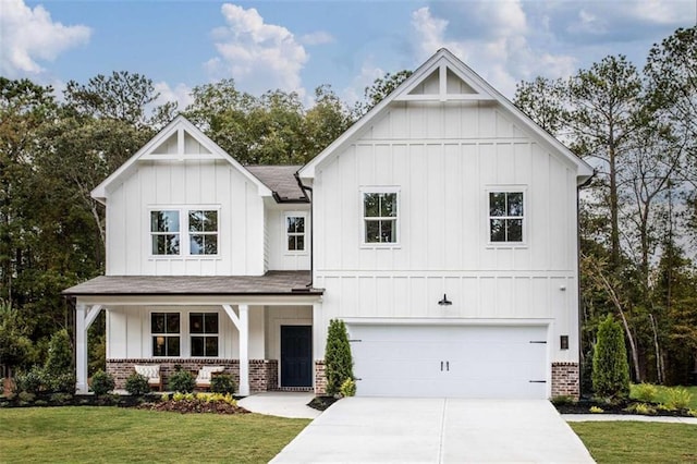 129 Henley St, Canton, GA 30114 - modern inspired farmhouse featuring board and batten siding, brick siding, and concrete driveway
