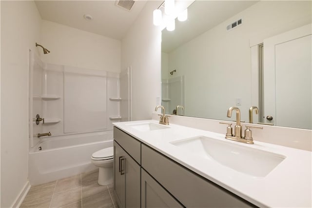 129 Henley St, Canton, GA 30114 - full bathroom with double vanity, tub / shower combination, and tile patterned floors