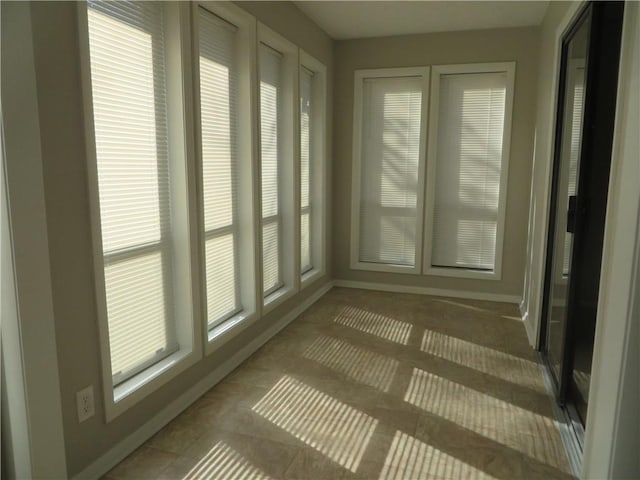 view of unfurnished sunroom