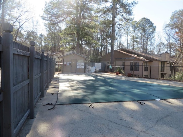 view of swimming pool with a patio area