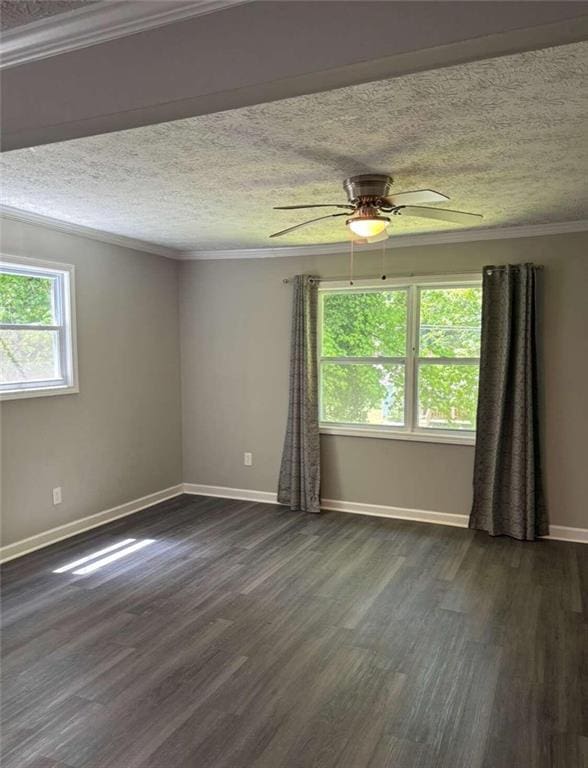 spare room featuring ornamental molding, ceiling fan, a textured ceiling, and dark hardwood / wood-style floors