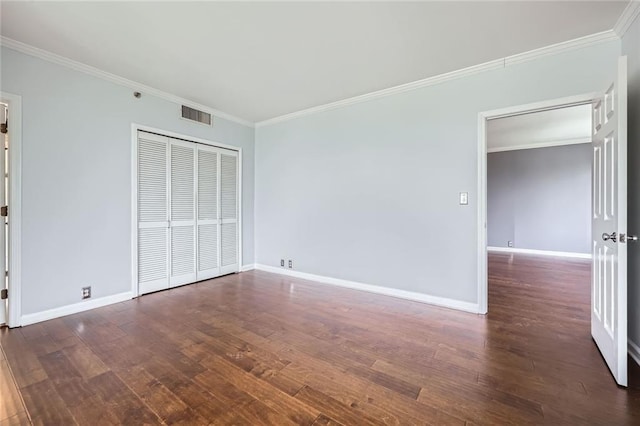 3481 Lakeside Dr NE Unit 1107, Atlanta, GA 30326 - spare room featuring crown molding, wood finished floors, and baseboards