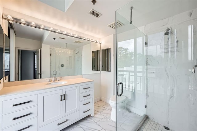 3481 Lakeside Dr NE Unit 1107, Atlanta, GA 30326 - full bathroom with a marble finish shower, vanity, marble finish flooring, and toilet