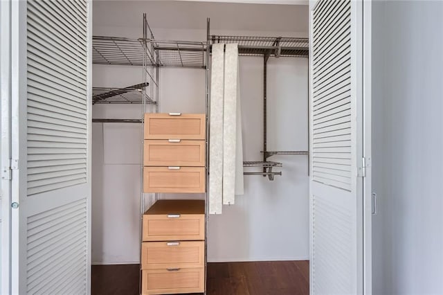 3481 Lakeside Dr NE Unit 1107, Atlanta, GA 30326 - walk in closet featuring dark wood-style floors