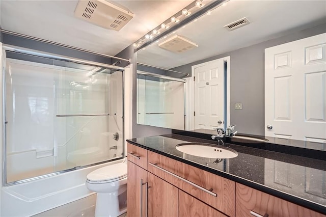 3481 Lakeside Dr NE Unit 1107, Atlanta, GA 30326 - full bath with vanity, toilet, and bath / shower combo with glass door
