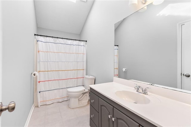 bathroom featuring vanity, toilet, and tile patterned flooring