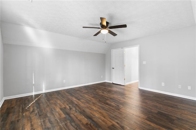 bonus room featuring dark hardwood / wood-style flooring, lofted ceiling, and ceiling fan